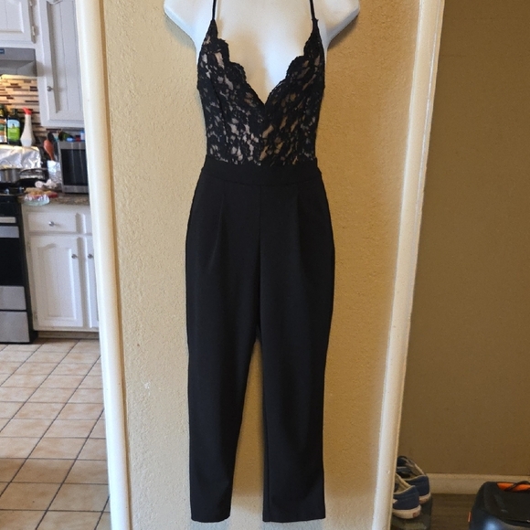 Express Black Lace Jumpsuit with Elegant Silhouette - Picture 1 of 3